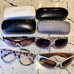 Lot of 4 Sunglasses and 4 Empty Cases